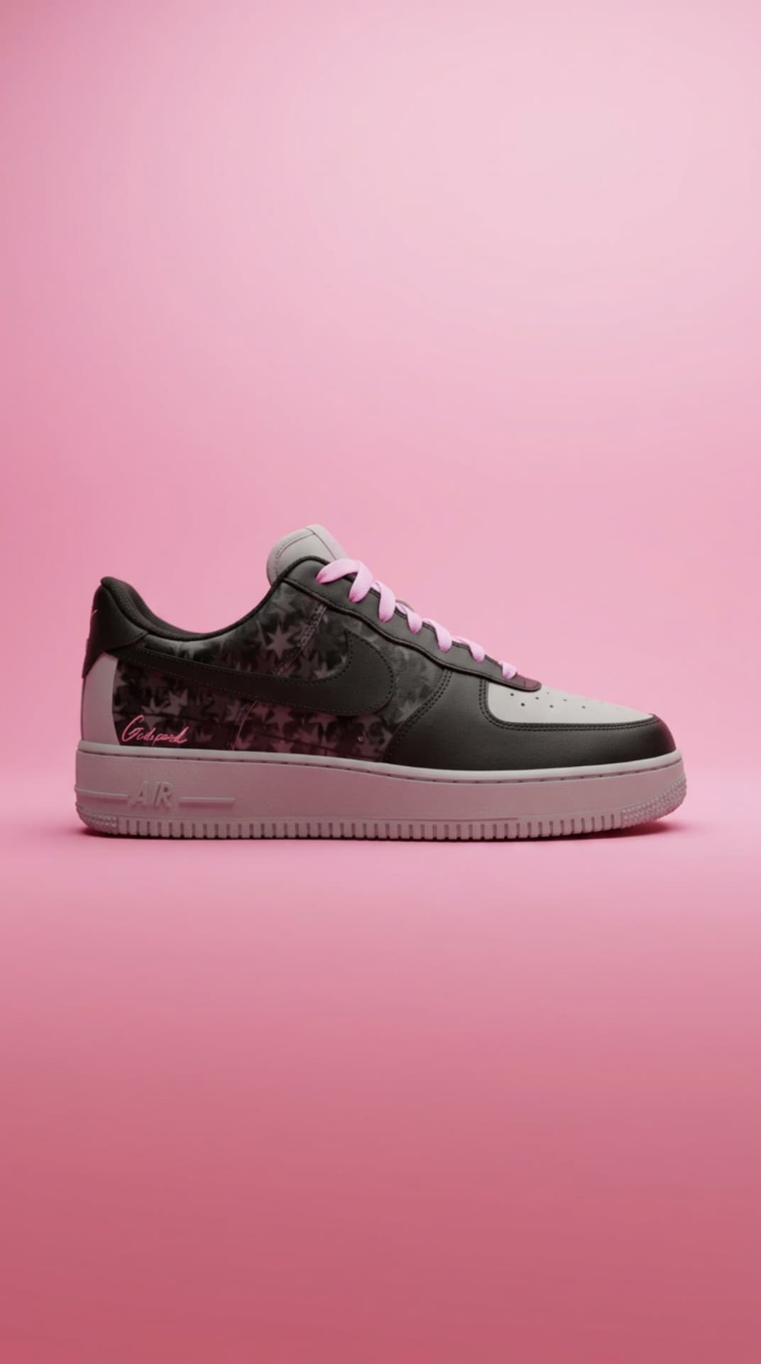 Black and grey Air Force 1 with a star-print panel and pink laces against a pink studio backdrop