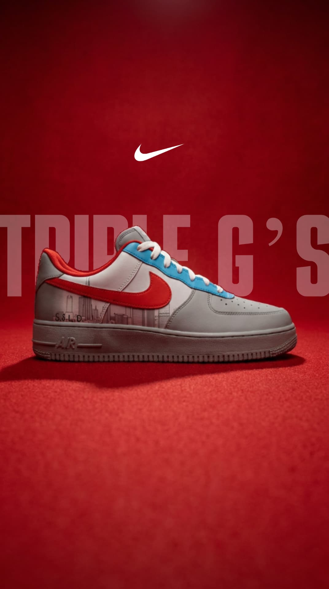 Grey and white Air Force 1 with a red swoosh and skyline panel on a deep red backdrop with Triple G's lettering