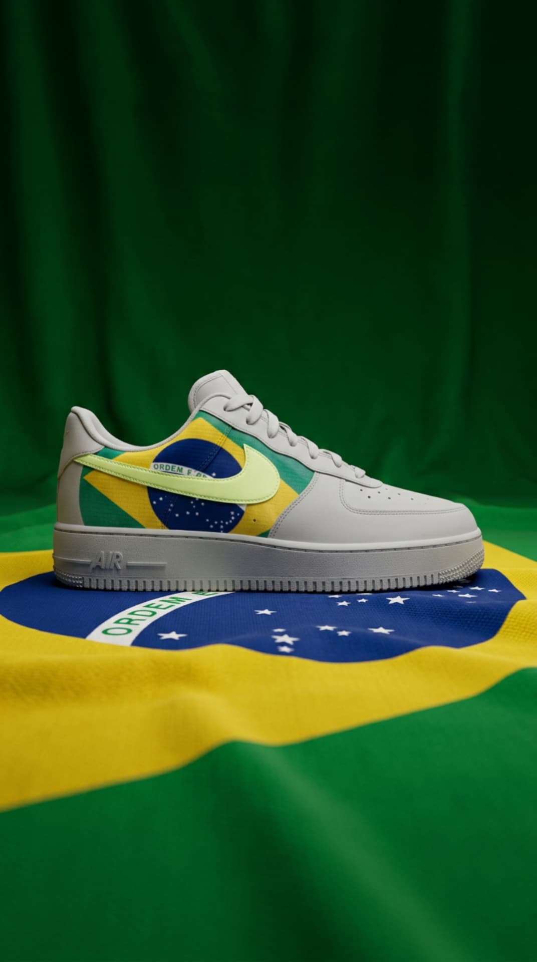 White Air Force 1 with a Brazil flag panel and volt swoosh resting on a Brazilian flag