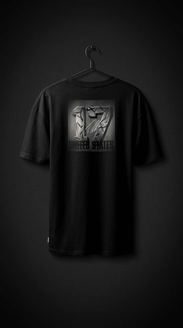 Blacked-out tee with a tonal 17 United States signature graphic on a hanger